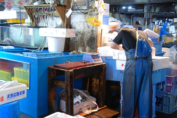 Very bloody table.  This guy just cut fish all morning.