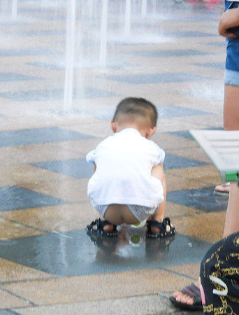 All toddlers here do not wear diapers.  They wear pants with slits .