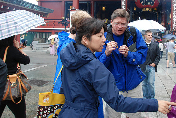 Jim asking Kazuko to explain what people are doing with the burning incense.