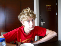 Trent woke up to our travel day with a great bed head!
