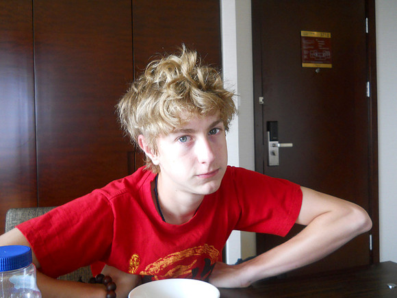Trent woke up to our travel day with a great bed head!