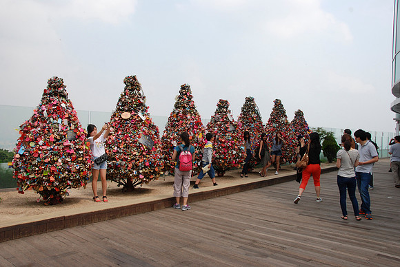 These iron trees are covered with "love padlocks."