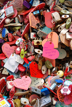 Love padlocks (also known as love locks and, in Taiwan, wish locks) are a custom by which padlocks are affixed to a fence, gate, bridge or similar public fixture by sweethearts to symbolize their eve