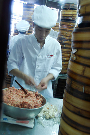 His hands were a blur in real life too. He's making dumplings