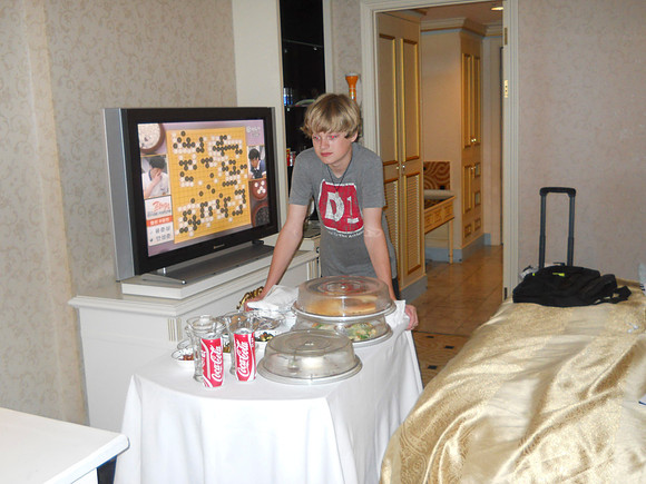 Jason brings in the room service cart.