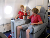 We have no idea why we were upgraded to business class on the flight, but we did not complain!