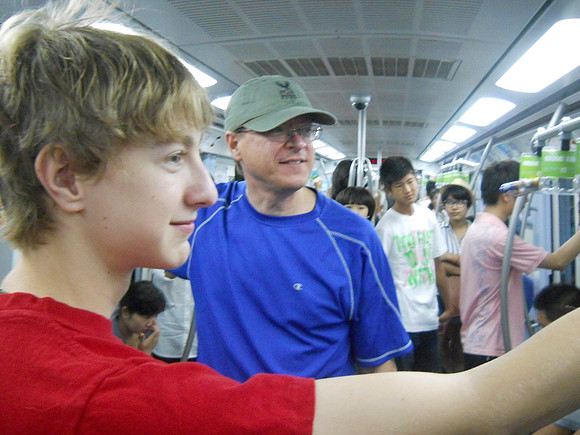 On the subway home from Summer Palace. Watching a funny video.