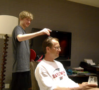Jason bought this head massage thing that he is using on Nelson!