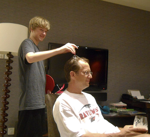 Jason bought this head massage thing that he is using on Nelson!
