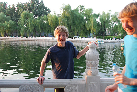 Jason climbed over the marble fencing.  Not sure what was so funny.