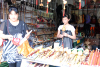 Mother and daughter shop owners.