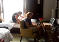 Trish and Joslyn hanging out in the apartment.