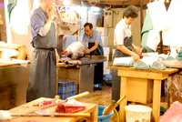 Slicing tuna with an electric  saw!