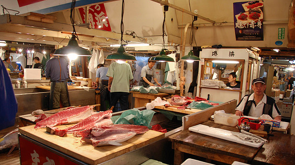 Cutting the large tuna.  Later our bus guide said this is the largest fish market in the world.  We believe it.  It was vey busy and everyone had their own work to keep them busy.