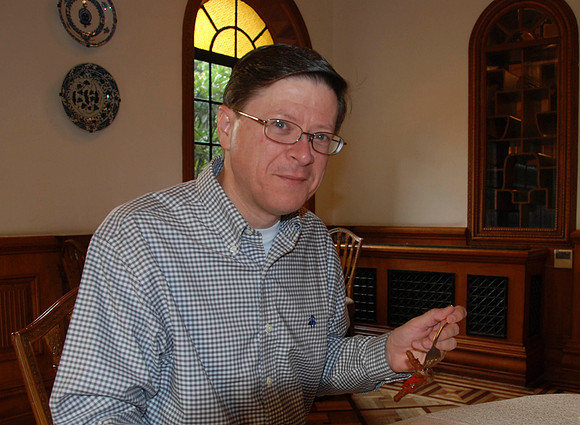 Jim tries chicken feet.