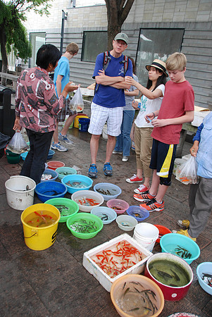 They were selling fish and turtles to release to the river for good luck.  We passed.