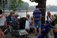 We often see older men sitting around playing a lively game of cards or chess.